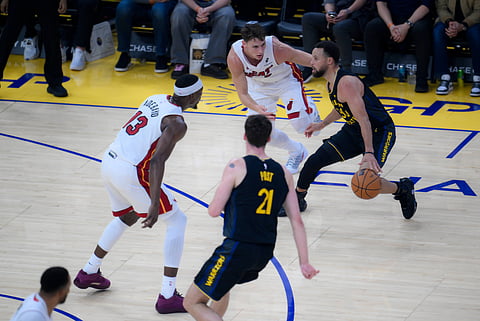 Golden State Warriors and Miami Heat players in action