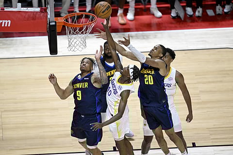 Los Angeles Lakers and Denver Nuggets players in action