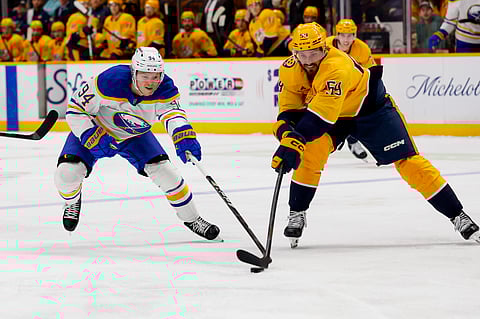 Konsta Helenius (L) in action against Nashville Predators