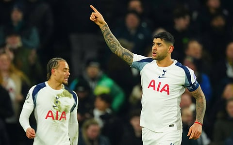 Captain Cristian Romero celebrates his goal against Borussia Dortmund