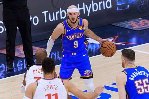 Alex Caruso of Oklahoma City Thunder with the ball