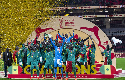 Senegal players lift the AFCON trophy