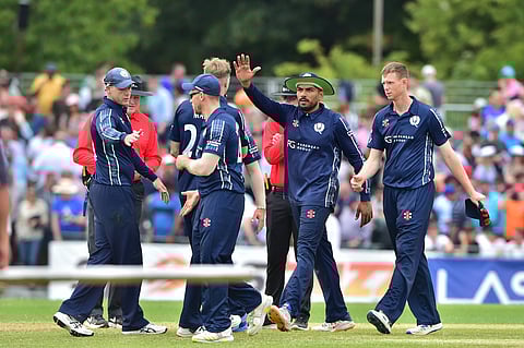 Players of Scotland celebrating a wicket