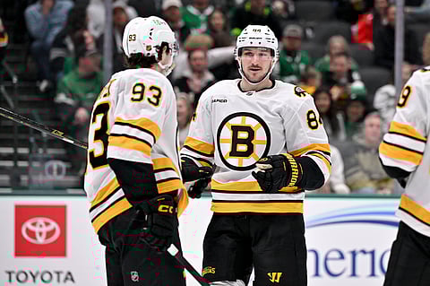 Fraser Minten and left wing Tanner Jeannot of Boston Bruins