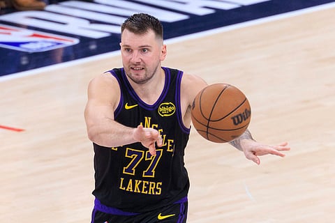 Luka Doncic of Los Angeles Lakers passes the ball
