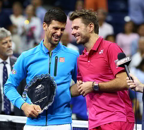 File photo of Novak Djokovic and Stan Wawrinka