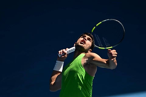 Carlos Alcaraz in action against Tommy Paul