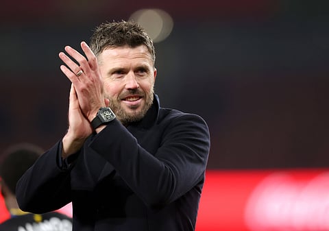 Michael Carrick celebrates victory at the Emirates Stadium