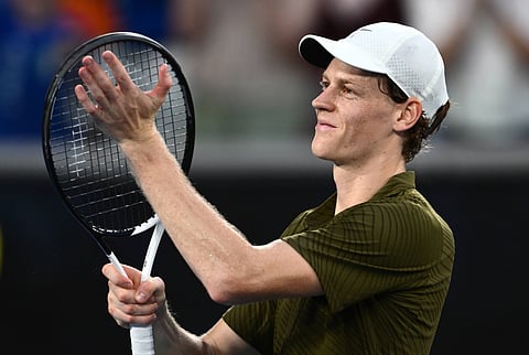 Jannik Sinner celebrates after advancing to Australian Open