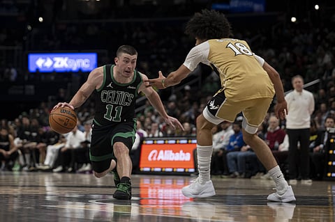 Payton Pritchard of Boston Celtics with the ball