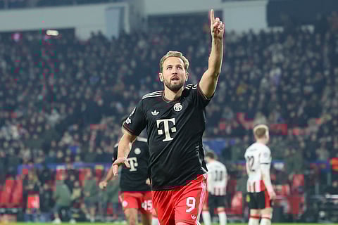 Harry Kane celebrates after scoring the winning goal for his side