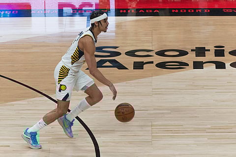 Andrew Nembhard of Indiana Pacers in action