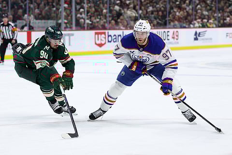 Edmonton Oilers and Minnesota Wild players in action