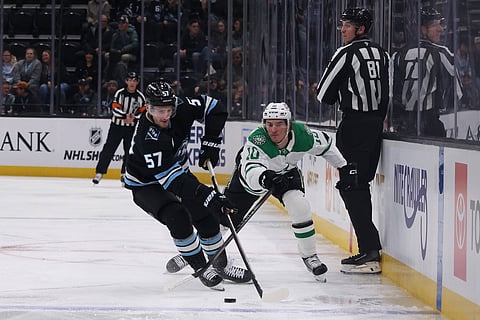 Players from the Dallas Stars and Utah Mammoth compete during the game