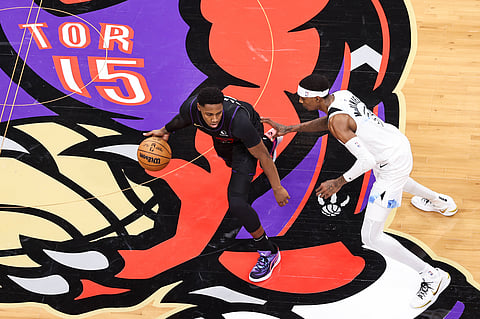 RJ Barrett of Toronto Raptors carries the ball