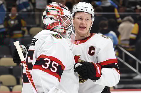 Ottawa Senators players celebrate goal against Pittsburgh Penguins
