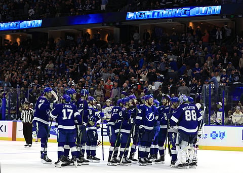 Tampa Bay Lightning players celebrate their win over Buffalo Sabres