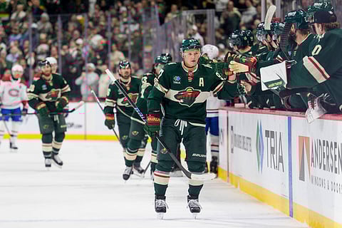 Minnesota Wild celebrating their goal in a game