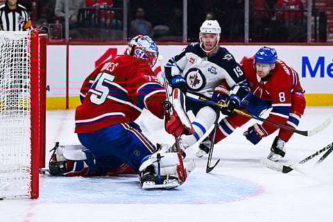 Winnipeg Jets and Montreal Canadiens players in action