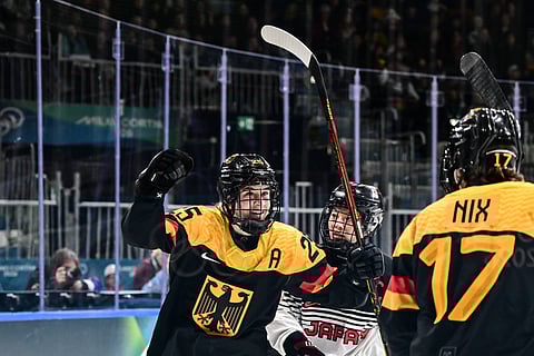 Nicola Hadraschek celebrates her goal against Japan
