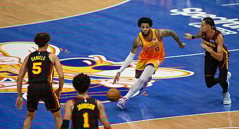 Charlotte Hornets and Atlanta Hawks players in action