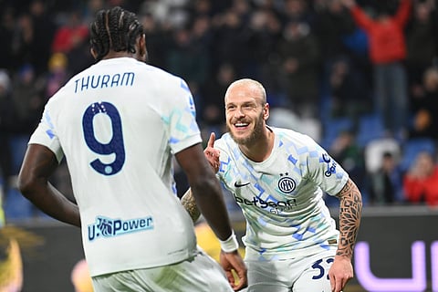 Federico Dimarco celebrates his goal with Marcos Thuram