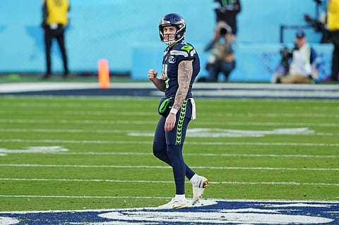 Michael Dickson reacts after a play against New England Patriots