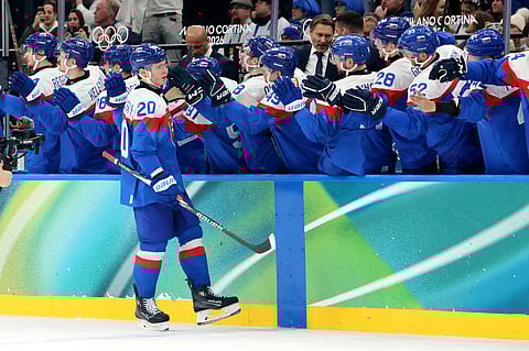 Juraj Slafkovsky celebrates his goal against Team Finland