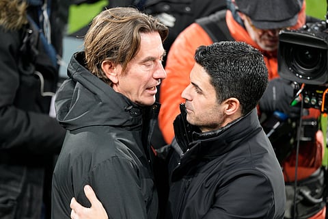 Mikel Arteta with Thomas Frank