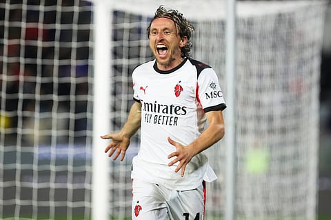 Luka Modric celebrates his winning goal against Pisa