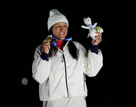 Elana Meyers Taylor poses with the gold medal