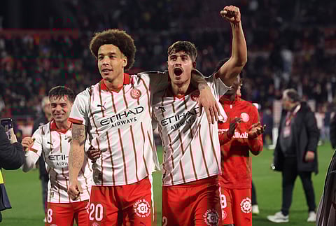 Axel Witsel and Hugo Rincon celebrate after win over FC Barcelona
