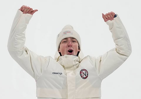 Tormod Frostad celebrates on the podium