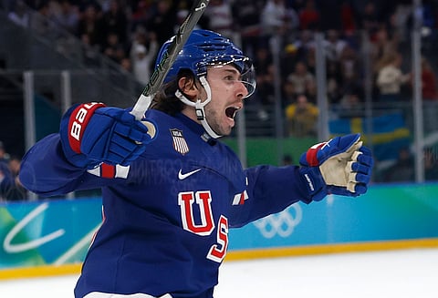 United States' Quinn Hughes celebrates after scoring the winning goal against Sweden