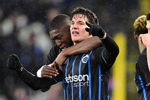 Christos Tzolis celebrates his late equalizer against Atletico Madrid