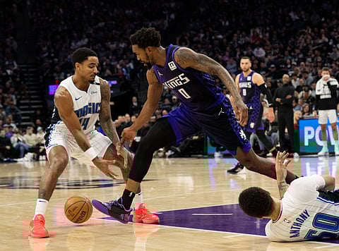 Sacramento Kings and Orlando Magic players in action