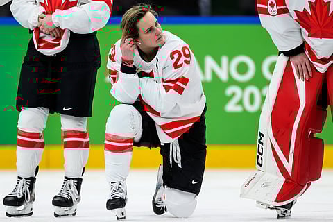 Marie-Philip Poulin looks dejected after losing the final against USA