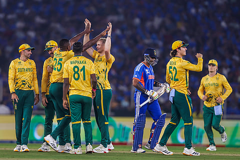South Africa players celebrate the wicket of Indian captain Suryakumar Yadav