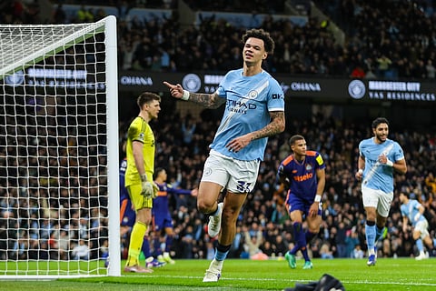 Nico O'Reilly celebrates his goal for Manchester City