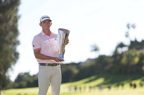 Jacob Bridgeman poses with the trophy