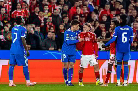 Gianluca Prestianni discusses with Vinicius Jr