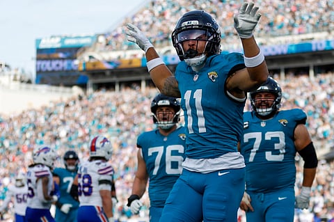 Jacksonville Jaguars players celebrate after scoring a touchdown