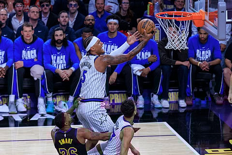 Paolo Banchero of Orlando Magic goes for a layup
