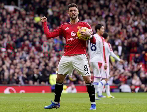 Bruno Fernandes celebrates after scoring the equalizing goal for Manchester United