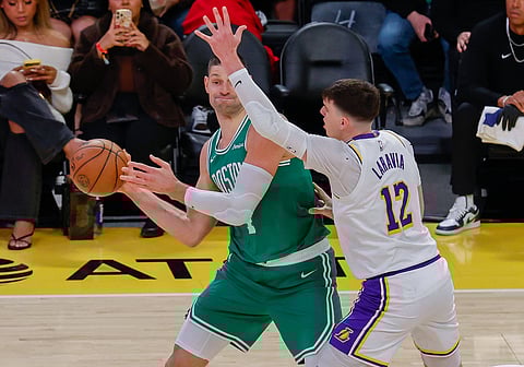 Nikola Vučević of Boston Celtics with the ball
