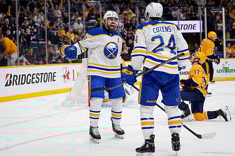 Buffalo Sabres players celebrate a goal