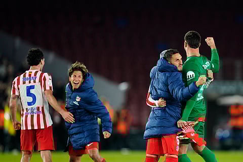 Atletico Madrid celebrate their victory over FC Barcelona on aggregate