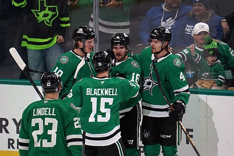 Dallas Stars players celebrate a goal
