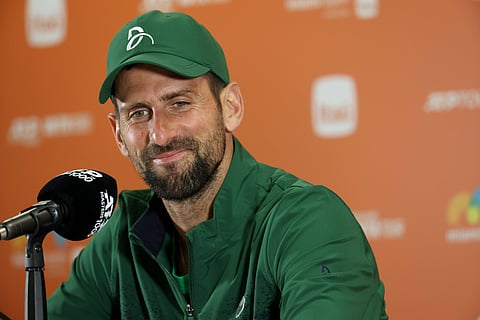 Novak Djokovic speaks to the media