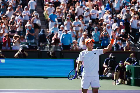Learner Tien celebrates after defeating Ben Shelton